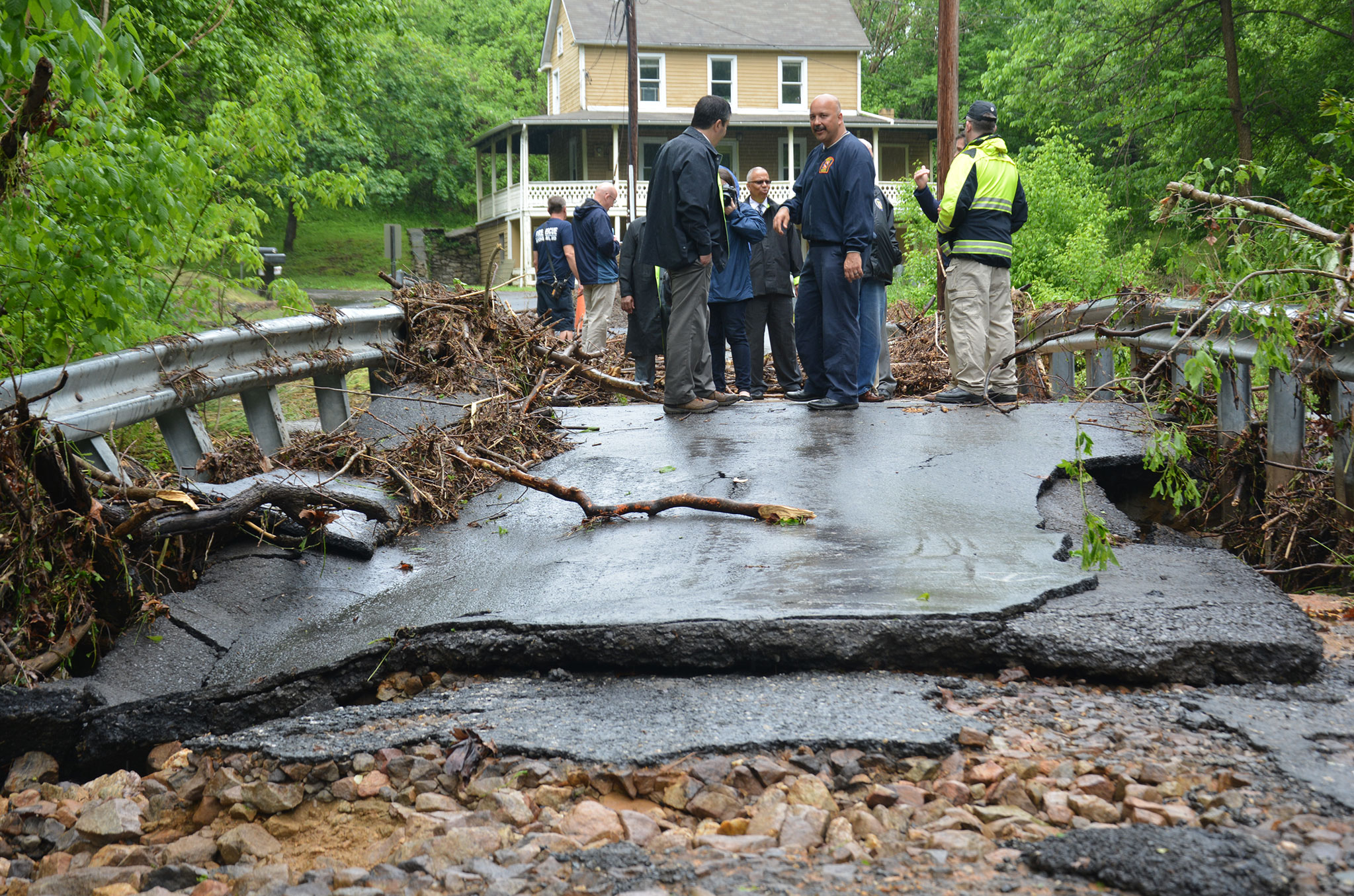 Broken bridge, torn up road